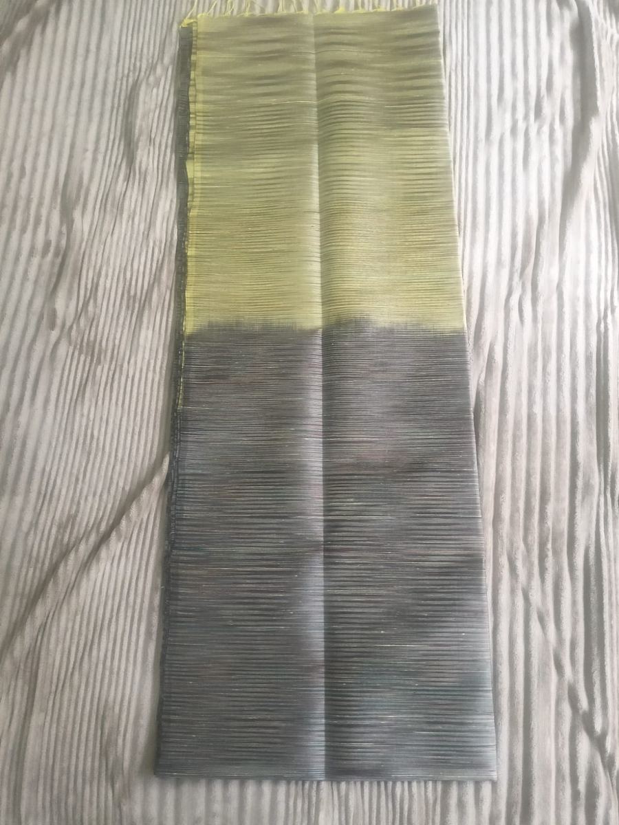 A dual tone tissue saree from our looms